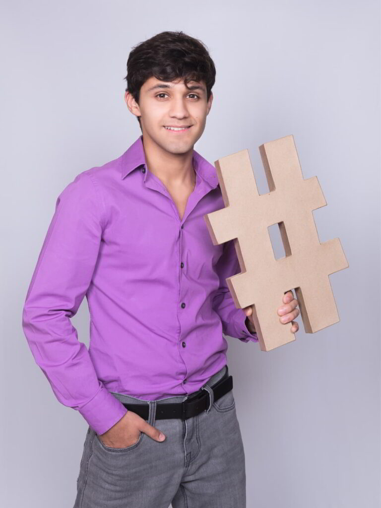 Man holding hashtag